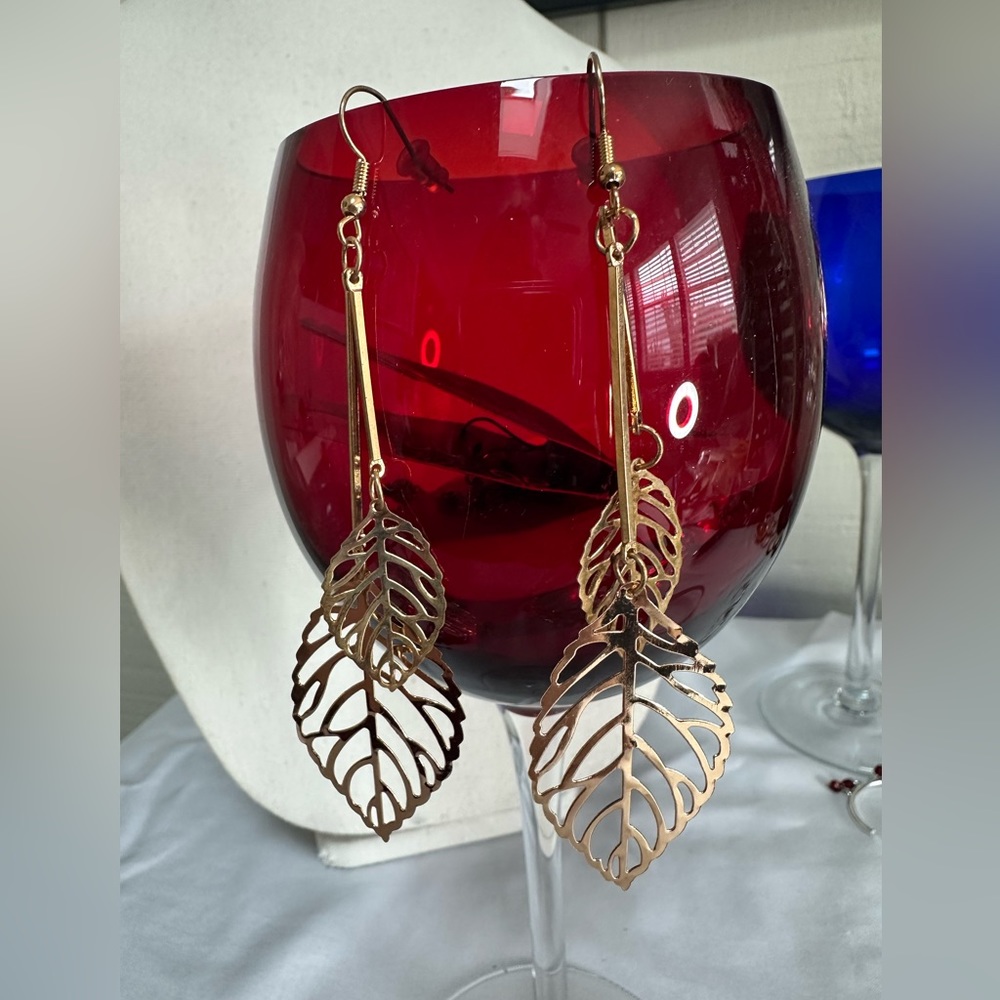 Long double leaf dangle goldtone earring